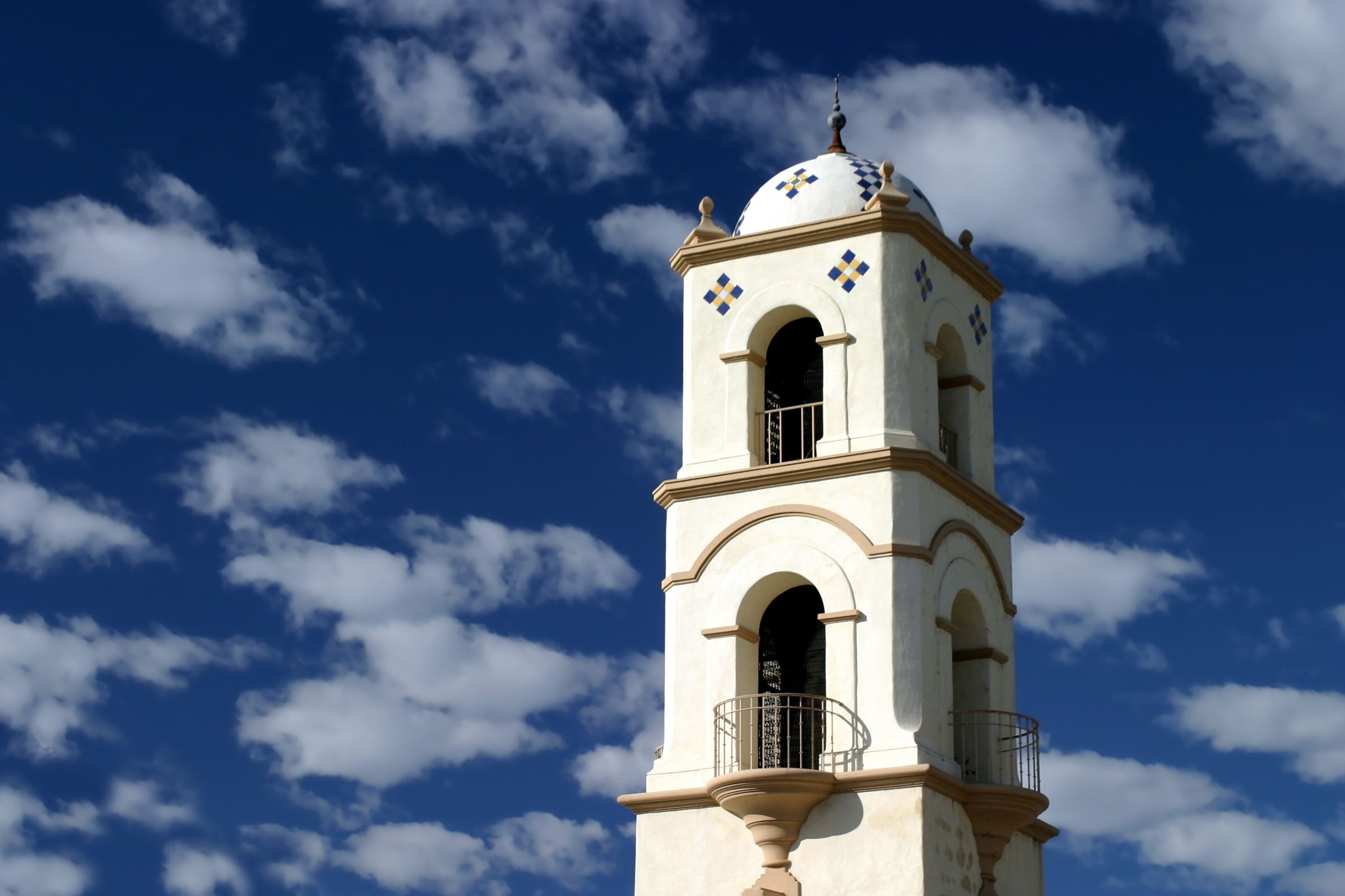 The Ojai post office bell tower against a blue sky